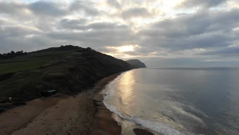 Aerial-View-Along-Charmouth-Beach-In-The-Morning
