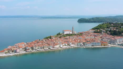 Aerial:-iconic-Piran-town-on-Slovenia’s-Adriatic-coast,-Venetian-architecture
