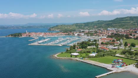 Aerial:-Izola-port-harbour-on-Adriatic-coast,-Mediterranean-Sea-in-Slovenia