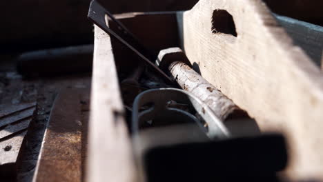 Old-wooden-toolbox-on-worktable.-Close-up