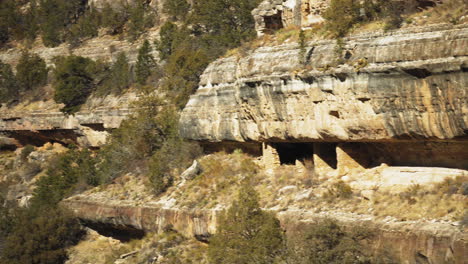Pan-Right-View-Of-Cliff-Side-Dwellings-At-Walnut-Canyon