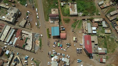 Aerial-view-over-the-Loitokitok-Open-Air-Market,-in-Kenya---top-down,-drone-shot