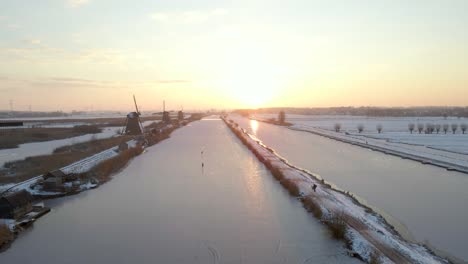 Winter-season-with-bright-morning-sunlight-at-popular-Dutch-Kinderdijk