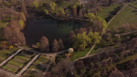 Aerial-Shot-Of-Urban-Park-With-Lake