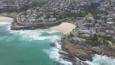 Aerial-View-Of-Tamarama-Beach-At-Mackenzies-Bay-With-Crashing-Waves-In-Eastern-Suburbs,-Sydney-NSW,-Australia