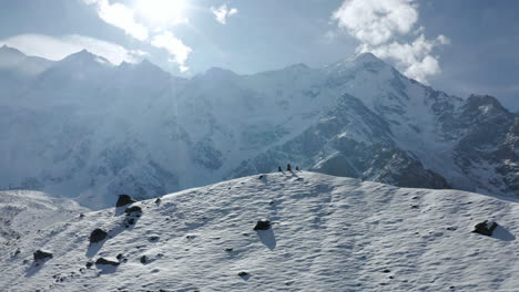 Men-at-the-top-enjoying-the-Mountain-Views-from-Nanga-Parbat-Basecamp-Pakistan