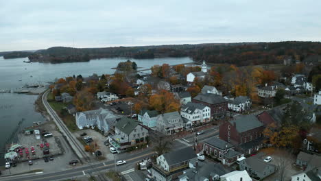Drone-footage-of-Wiscasset,-Maine-downtown-in-autumn-during-sunset