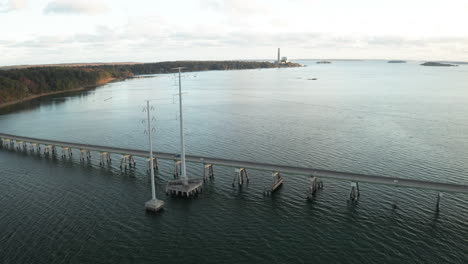 Aerial-of-large-powerlines-crossing-Casco-Bay-with-Yarmouth-Maine-power-plant-in-background