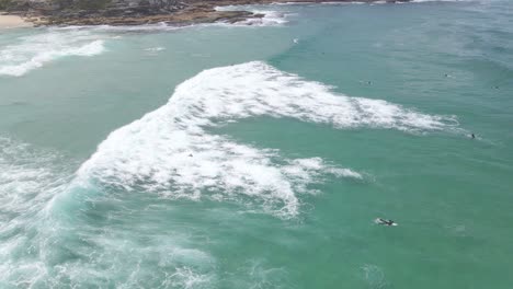 Surfing-At-Tamarama-Beach---Surfer-Fell-Off-The-Surfboard-Due-To-Stong-Waves-In-Sydney,-NSW,-Australia