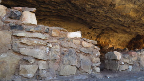 Sandstone-Walls-Of-Cave-Dwellings-At-Walnut-Canyon-By-Trail-Path