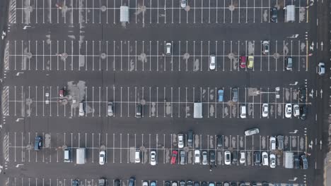AERIAL:-Cars-Driving-in-a-Parking-Lot-During-Quarantine
