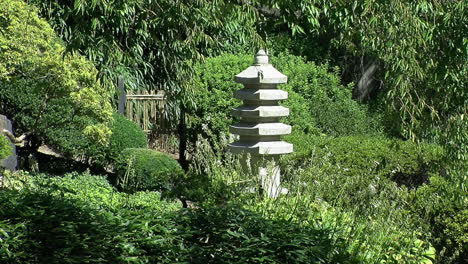 A-stone-pagoda-stands-in-a-Japanese-garden