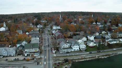 Aerial-footage-of-Wiscasset,-Maine-downtown-in-autumn-during-sunset