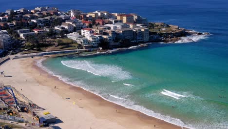 Several-People-On-Bondi-Beach-At-Daytime-Overlooking-Ben-Buckler-Point-In-Sydney-Suburbs,-New-South-Wales,-Australia