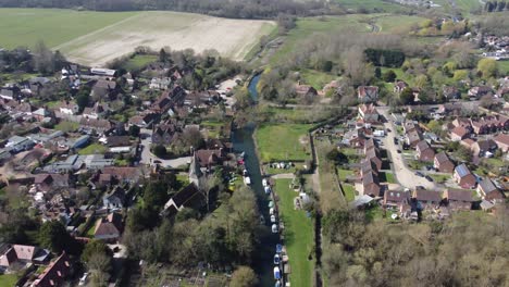 Drone-flies-backwards-over-the-small-village-Fordwich,-England