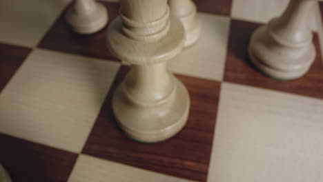 Tilt-Up-Shot-Reveals-White-Queen-Chess-Piece-a-Leadership-Concept,-Closeup-View