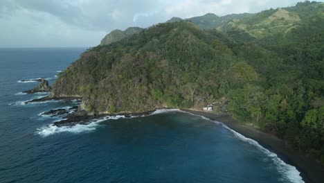 Aerial-view-of-Kings-Peter-Bay-a-black-sand-beach-on-the-Caribbean-island-of-Tobago