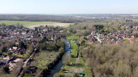 Drone-flies-backwards-above-the-small-village-Fordwich,-England