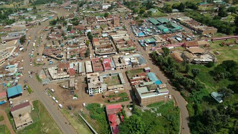 Aerial-drone-view-overlooking-the-Open-Air-market-in-a-village,-in-sunny-Kenya