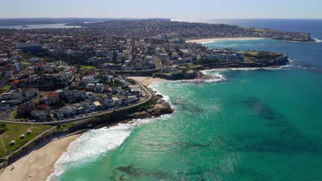Aerial-Of-Sydney-Eastern-Suburbs-With-Bronte,-Tamarama,-And-Bondi-Beaches-In-Pacific-Ocean,-New-South-Wales,-Australia
