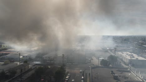 large-structure-fire-fills-streets-with-smoke