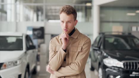 Stylish-handsome-man-standing-in-front-of-choosing-a-car