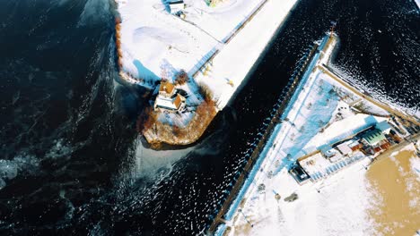 Aerial-View-Of-Port-Harbour-Entrance-Snow-Covered-Landscape
