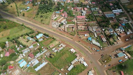 Aerial-drone-view-overlooking-streets-and-houses-in-the-Oloitokitok-town,-in-Kenya