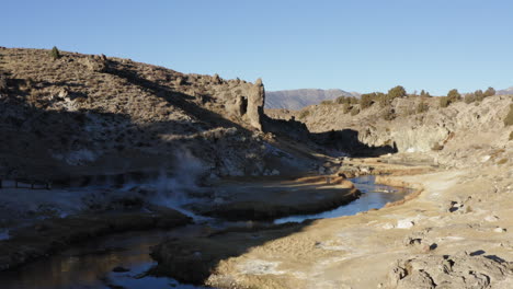 Steaming-Hot-Spring-in-Rocky-Valley,-Geothermal-Spring-in-Inyo-National-Forest,-Aerial