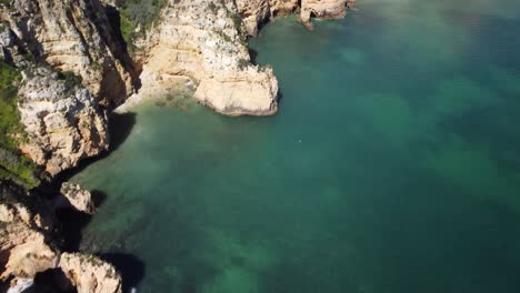 Aerial-View-Of-The-Cliffs-In-Ponta-da-Piedade,-Lagos,-Algarve,-Portugal