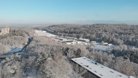 Aerial-view-of-snowy-winter-in-Gothenburg,-Sweden,-wide-shot-forward