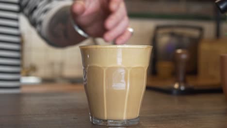Caucasian-Barista-Prepared-Coffee-Drink---close-up-shot