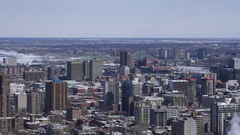 Wide-Shot-of-Montreal-Urban-City-Buildings-with-Jacques-Cartier-Bridge-in-Background
