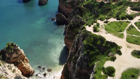 Aerial-View-Of-The-Cliffs-In-Ponta-da-Piedade,-Lagos,-Algarve,-Portugal