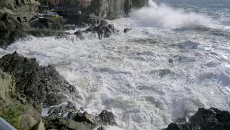 Panoramic-slowmotion-of-Manarola,-Cinque-Terre,-during-a-sea-storm