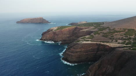 Panoramic-coast-of-volcanic-island-Porto-Santo-in-Atlantic-ocean,-aerial