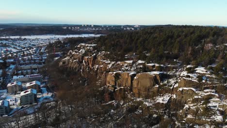 Aerial---Mountains-in-Utby,-suburb-of-Gothenburg,-Sweden,-wide-spinning-shot