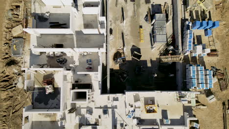 top-down-over-initial-stage-of-construction-of-a-multi-family-block-of-flats,-aerial