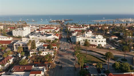 Aerial-view-over-State-street-towards-Stearns-Wharfs-and-the-beach,-in-Santa-Barbra,-California