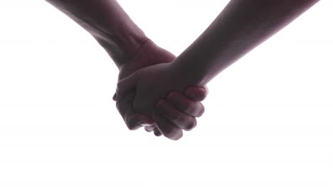 Close-up-Of-A-Woman-And-A-Man-Holding-Hand-In-Hand