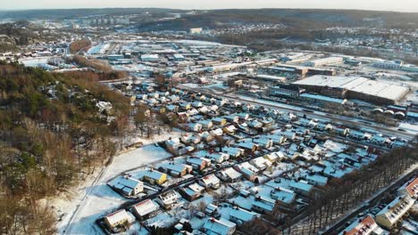 Rows-Of-Houses-And-Buildings-In-Snowy-Village-In-The-Outskirts-Of-Gothenburg,-Sweden-During-Winter