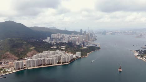 Waterfront-residential-buildings-in-Hong-Kong-bay,-Aerial-view