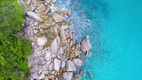 aerial-footage-of-sea-shore-and-mountains