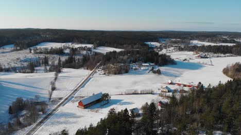Bird's-Eye-View-Of-Swedish-Road-In-A-Countryside-Village-During-Winter-In-Sweden
