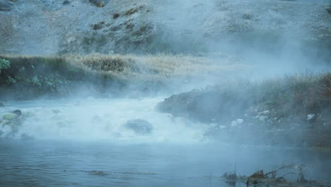 Hot-Steam-Rising-from-Famous-Hot-Spring,-Hot-Creek-Geological-Site,-Inyo-National-Forest,-Low-Angle