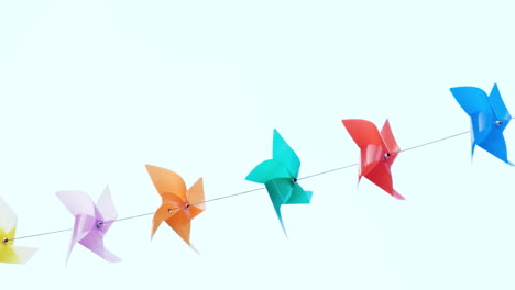 Colourful-plastic-pinwheels-rotate-with-blowing-wind
