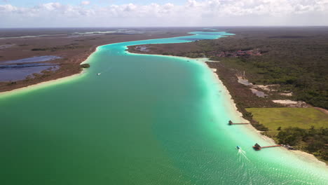 Wide-drone-shot-of-turquoise-waters-in-Bacalar-Mexico