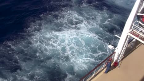 Aerial-view-of-a-cruise-ship's-wake-from-a-vacationer's-perspective