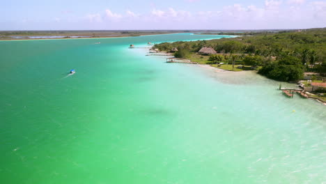 Drone-shot-over-turquoise-color-waters-at-Bacalar-Mexico
