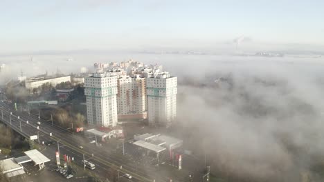 Drone-shot-of-City-in-fog